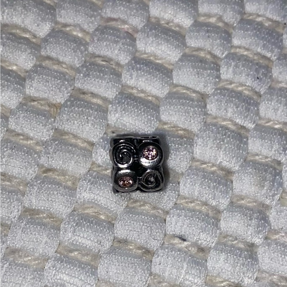 Authentic Pandora Silver Fantasy Swirl retired Charm with Pink CZ